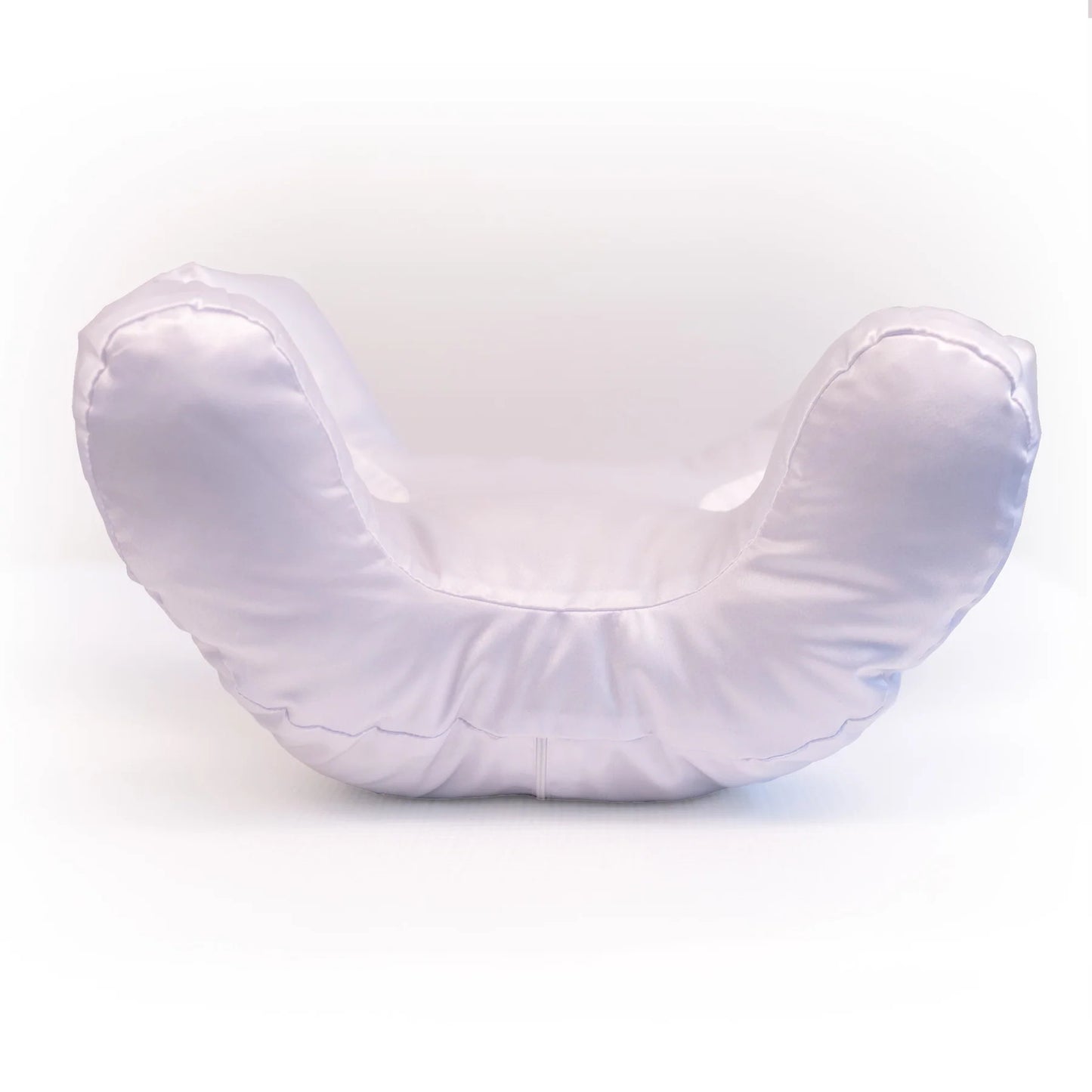 White anti-wrinkle face-up pillow on a white background