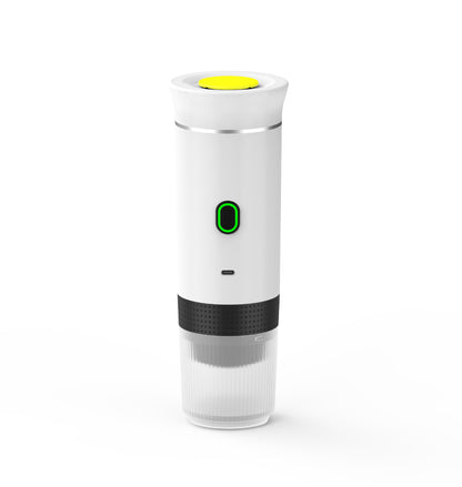 White portable coffee maker with a yellow top and green indicator light on a white background