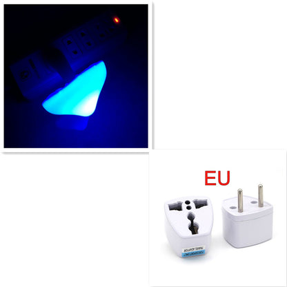 Electric plug adapter with mushroom shaped night light on a black background and two white plugs labeled 'EU' on a white background.