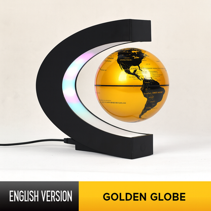 golden globe with a black 'C' shaped stand on a light beige background