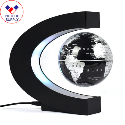 Levitating globe with black base and white background
