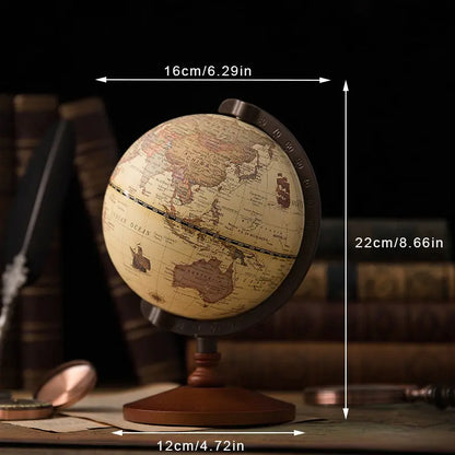Vintage-style globe with measurements on a dark background