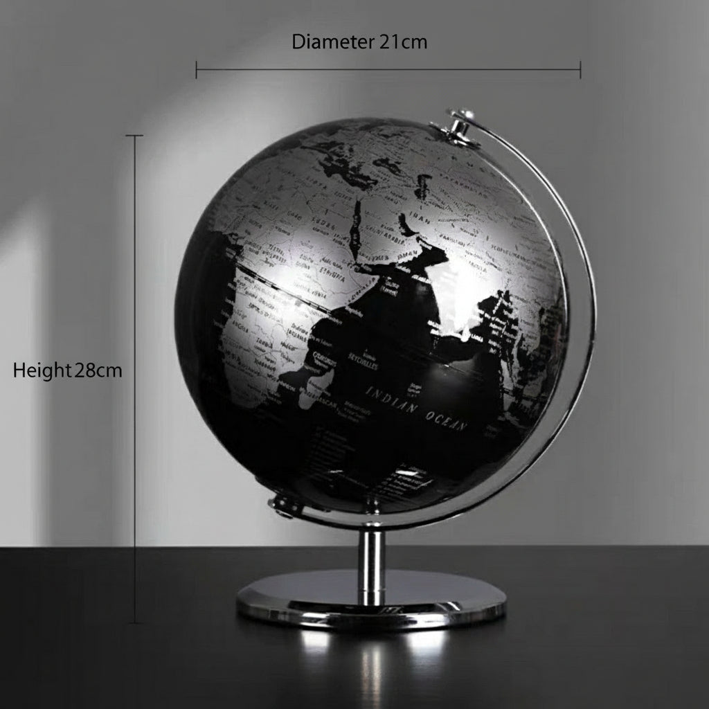 Black and silver globe with measurements on a gray background
