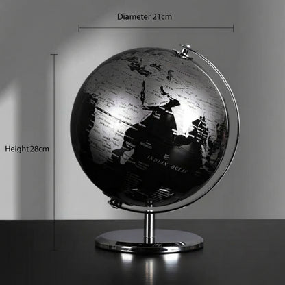Black and silver globe with measurements on a gray background