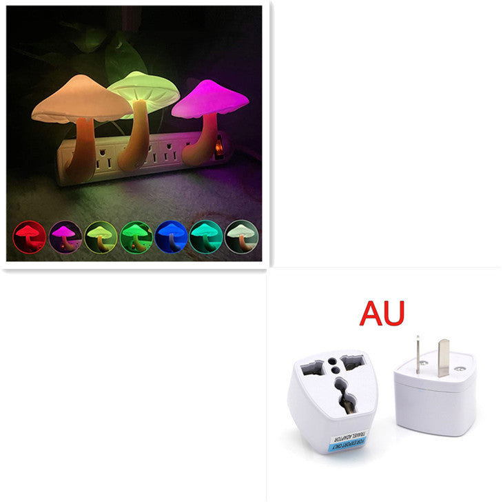 Colorful mushroom-shaped night lights with a plug adapter on a white background.