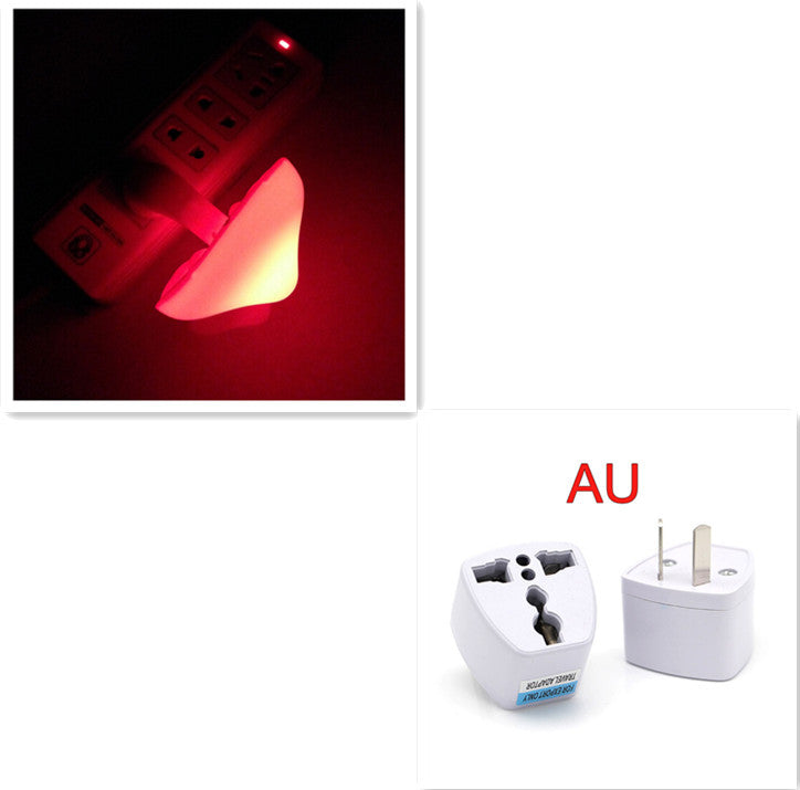 Power adapter with mushroom shaped night light on a white background