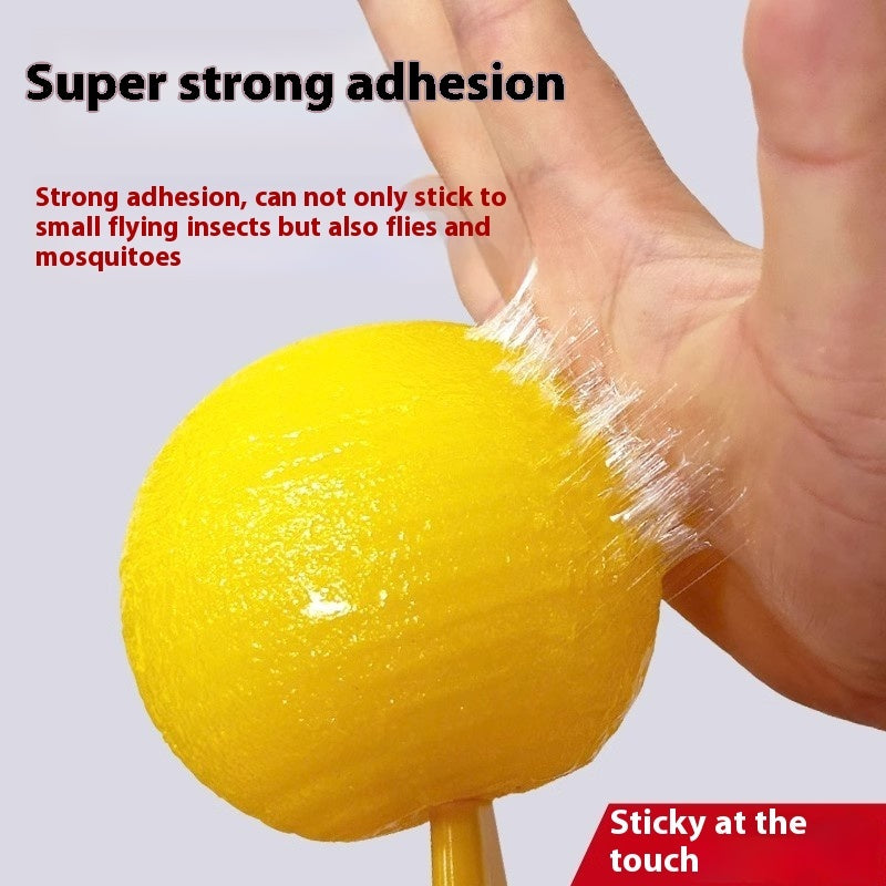 Yellow insect trap with sticky substance being peeled off by a hand, with text about strong adhesion.